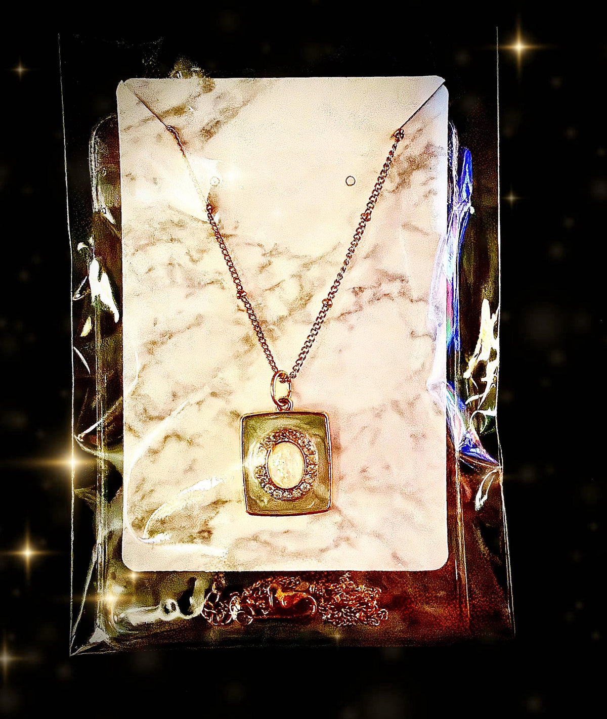 Vintage inspired elegant charm with gold tone necklace