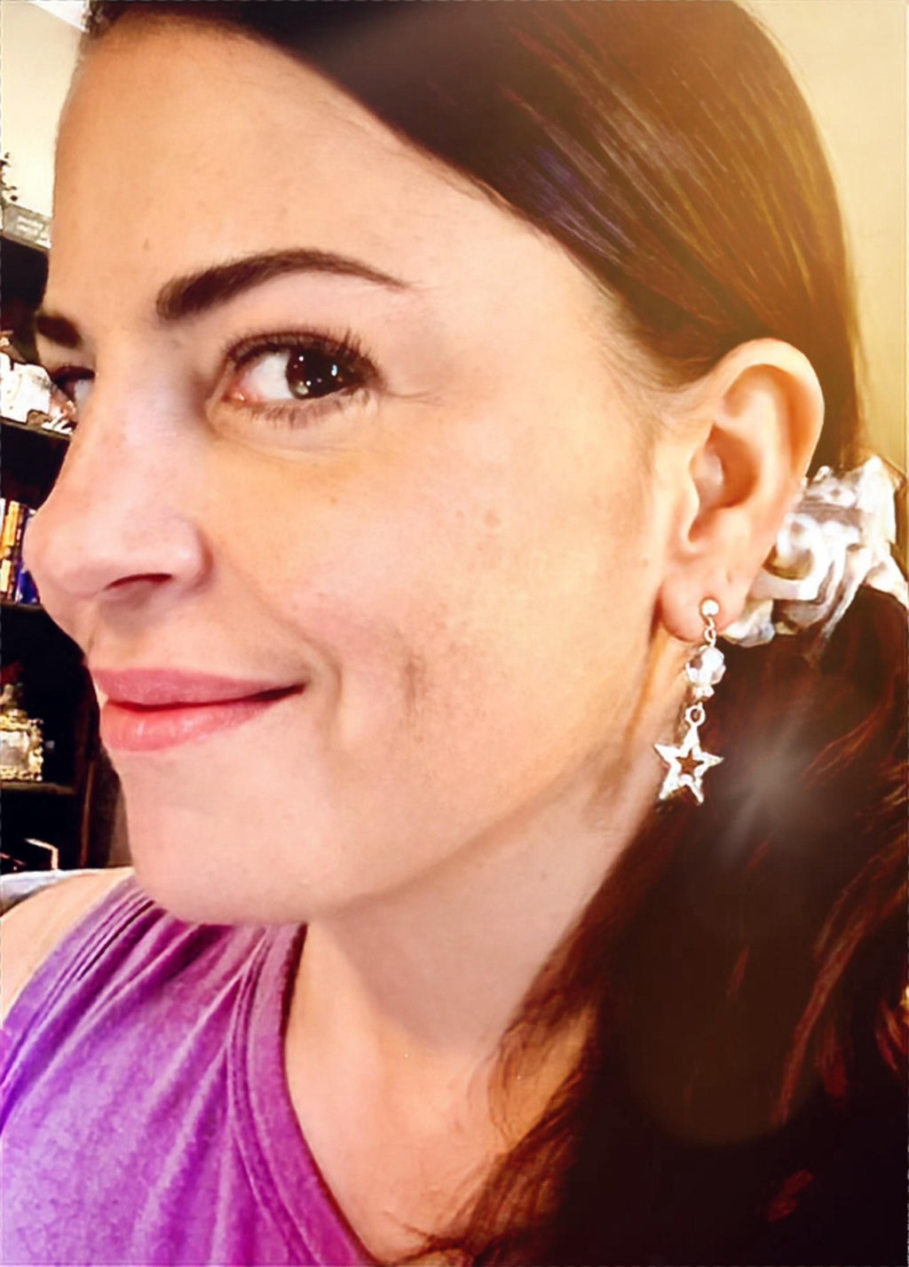 Silver glitter star earrings with shades of purple glass beads