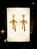 Bow earrings gold tone and shimmering light brown Australian crystal
