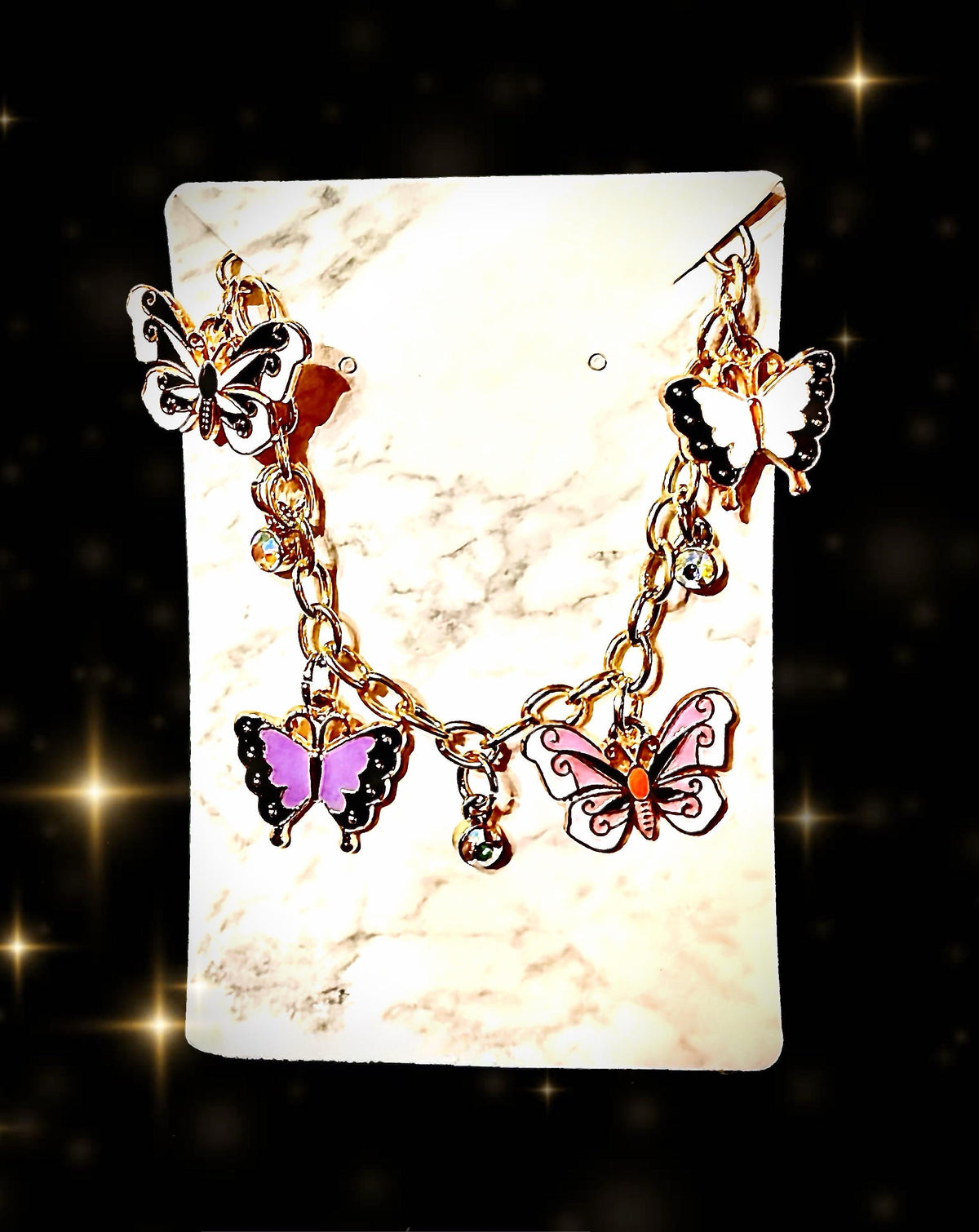 Butterfly and bling gold tone